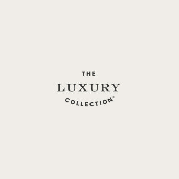 Logotipo de The Luxury Collection con fuente elegante en un diseño circular.