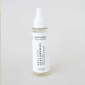 Envase de bruma floral facial equilibrante de Beseaskin, 100% orgánica a base de Neroli, Agua Termal y Concentrado de Posidonia con fondo blanco.
